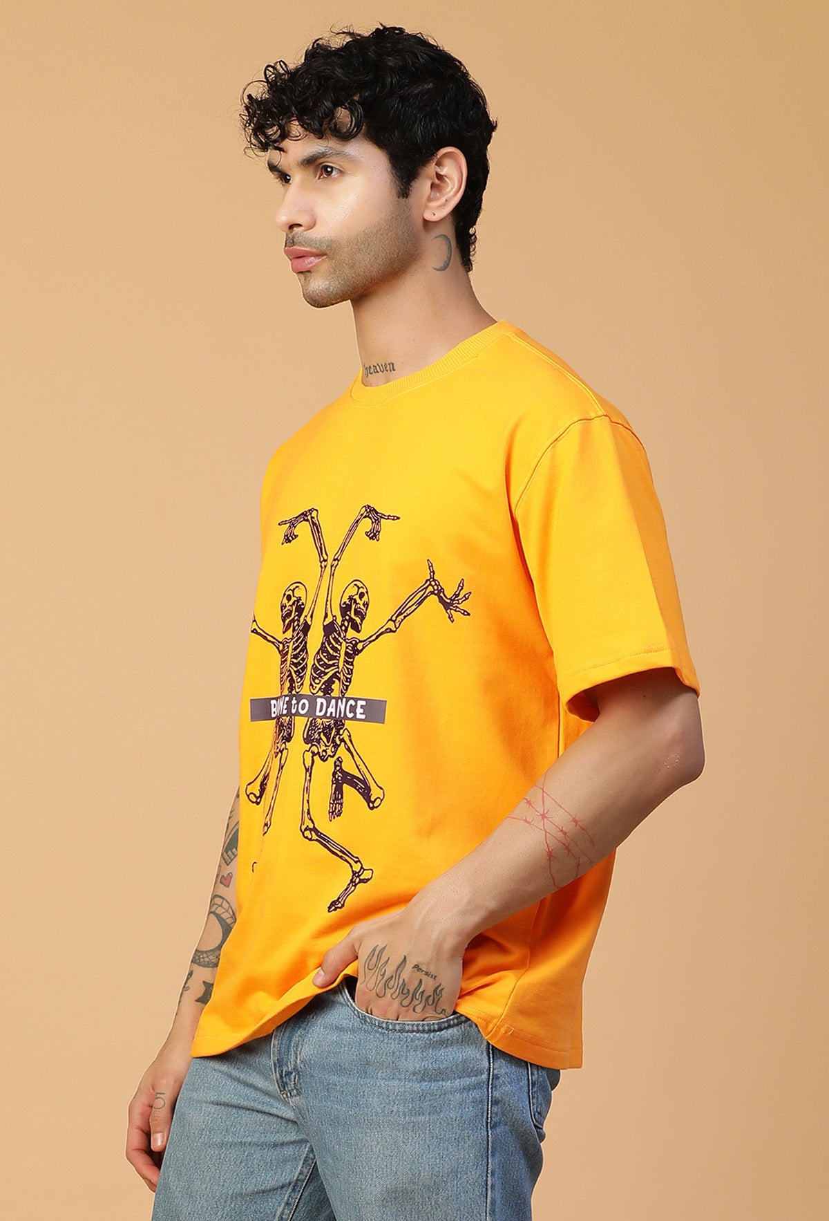 Graphic Printed Bones Pure Cotton Oversized T-shirt mustered.