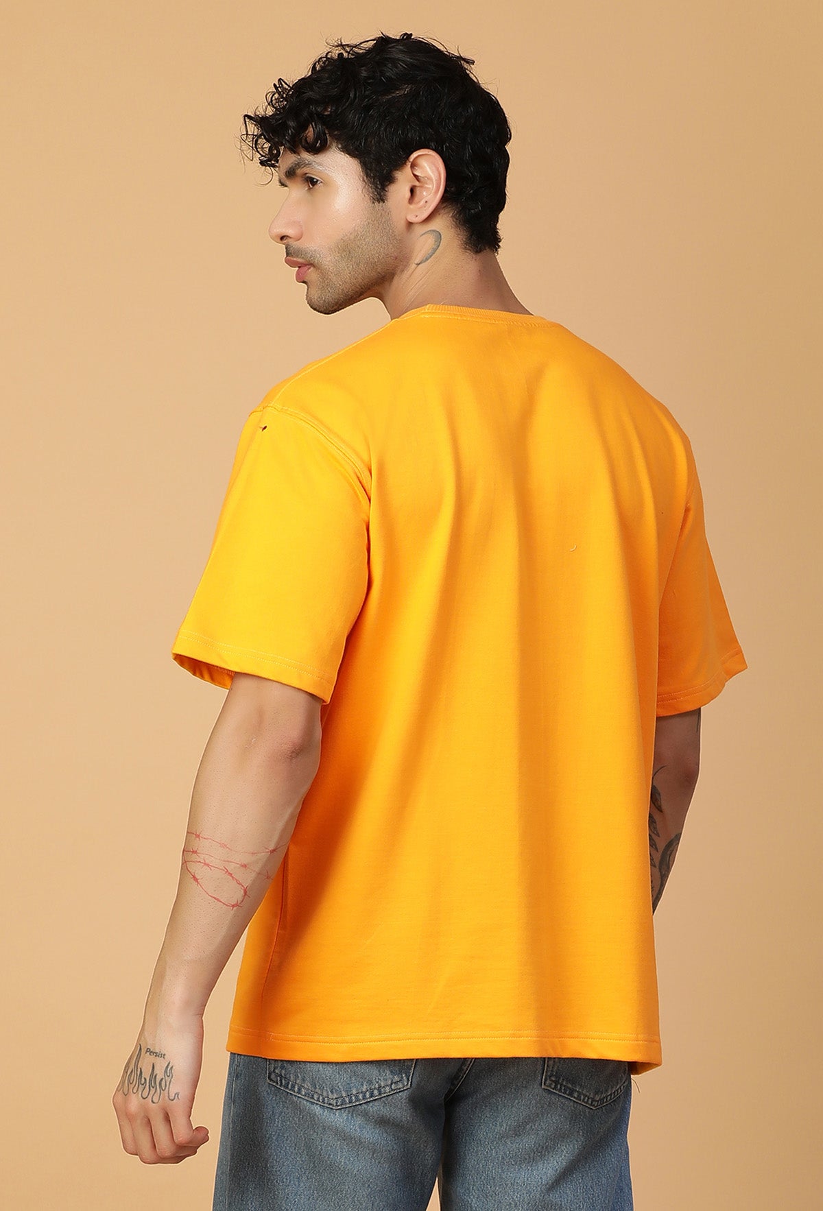 Graphic Printed Bones Pure Cotton Oversized T-shirt mustered.