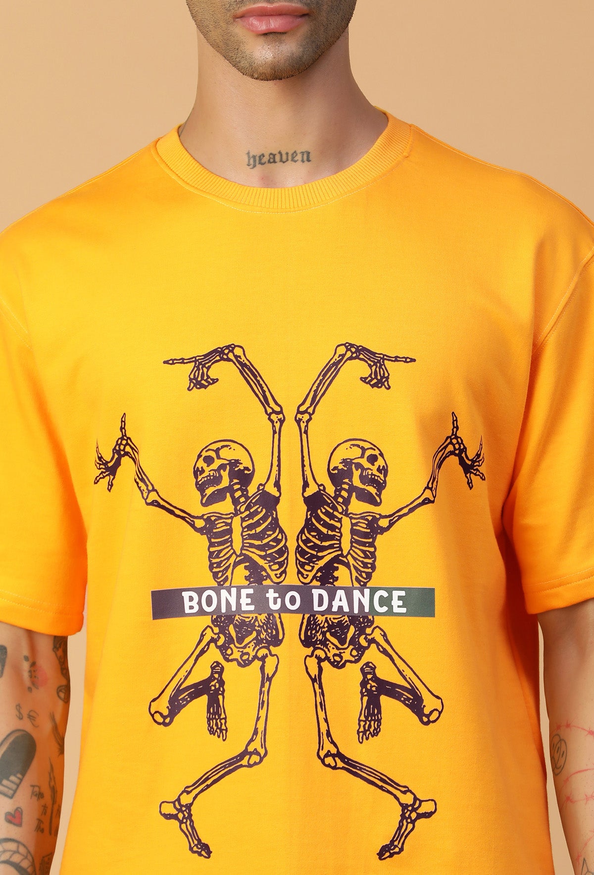 Graphic Printed Bones Pure Cotton Oversized T-shirt mustered.