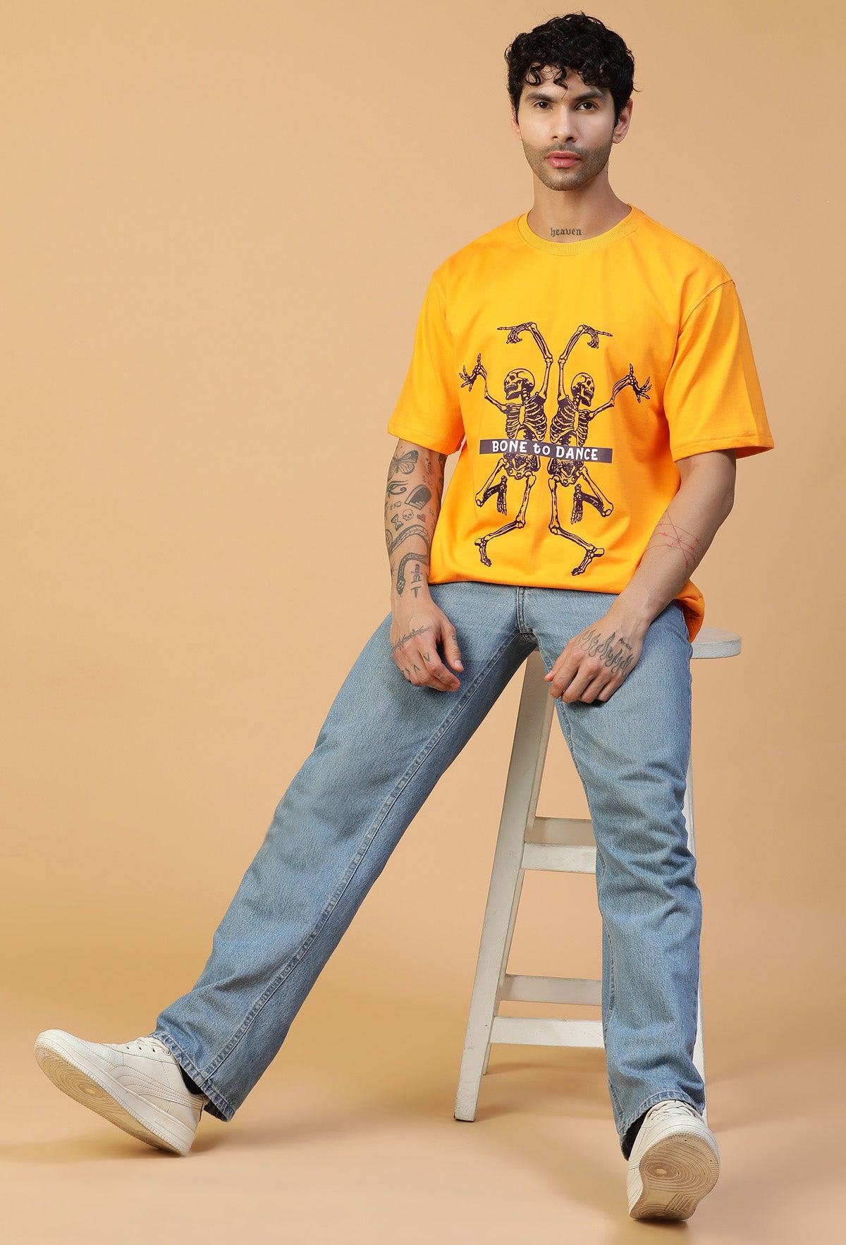 Graphic Printed Bones Pure Cotton Oversized T-shirt mustered.