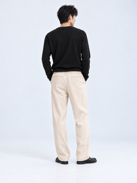 DILI men's beige relaxed straight-fit trousers, front view with drawstring waist.