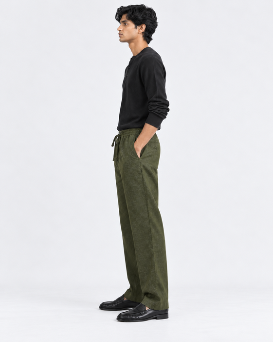 DILI men's dark olive green relaxed straight-fit trousers styled with a black Henley top.
