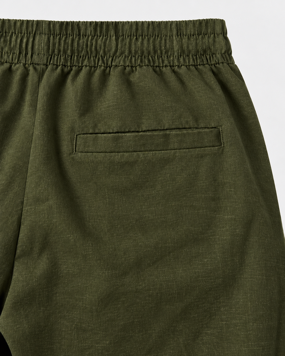 DILI men's dark olive green relaxed straight-fit trousers styled with a black Henley top.