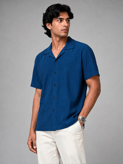 Side view of men's royal blue textured half-sleeve shirt