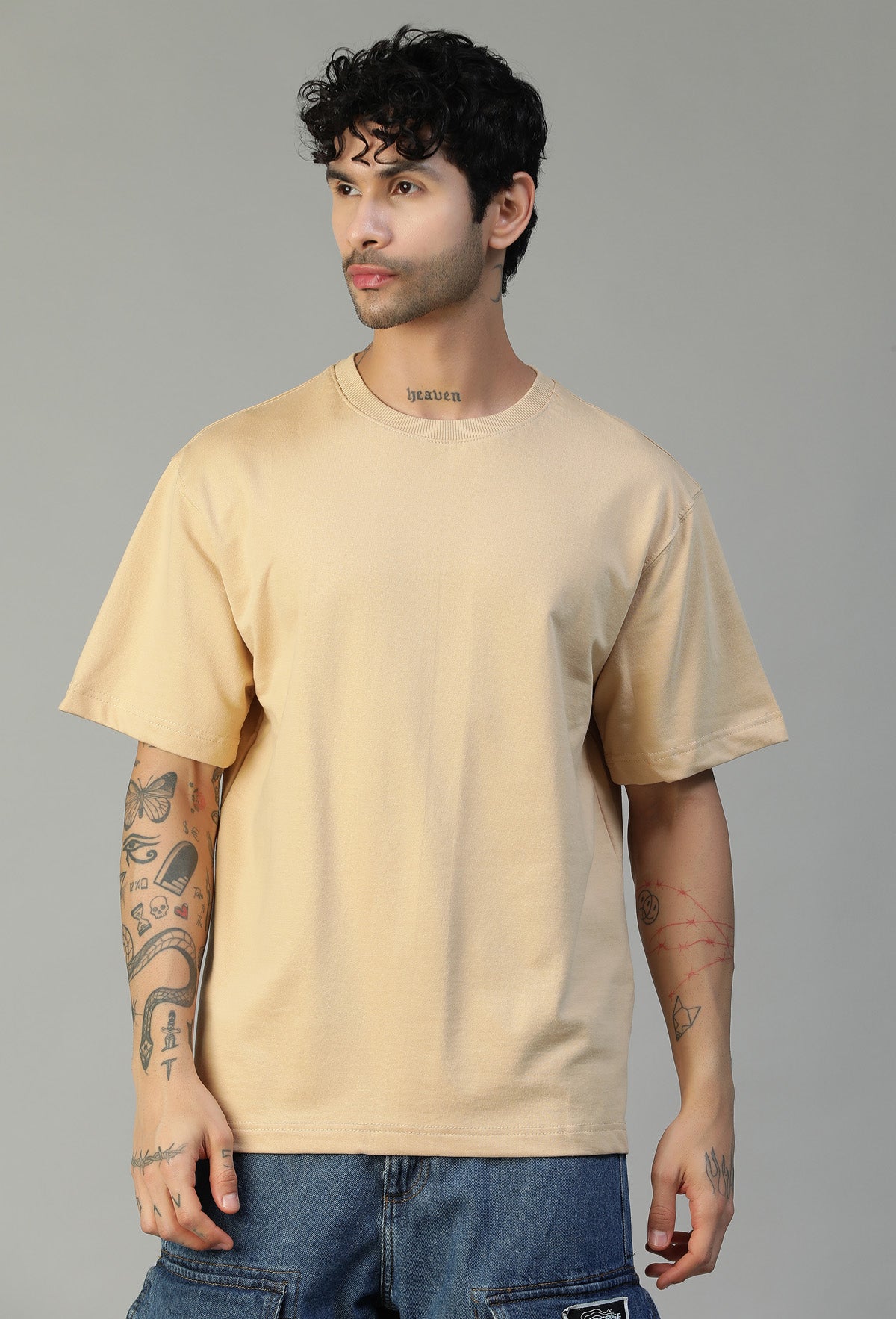 Front view of men's solid beige oversized cotton T-shirt