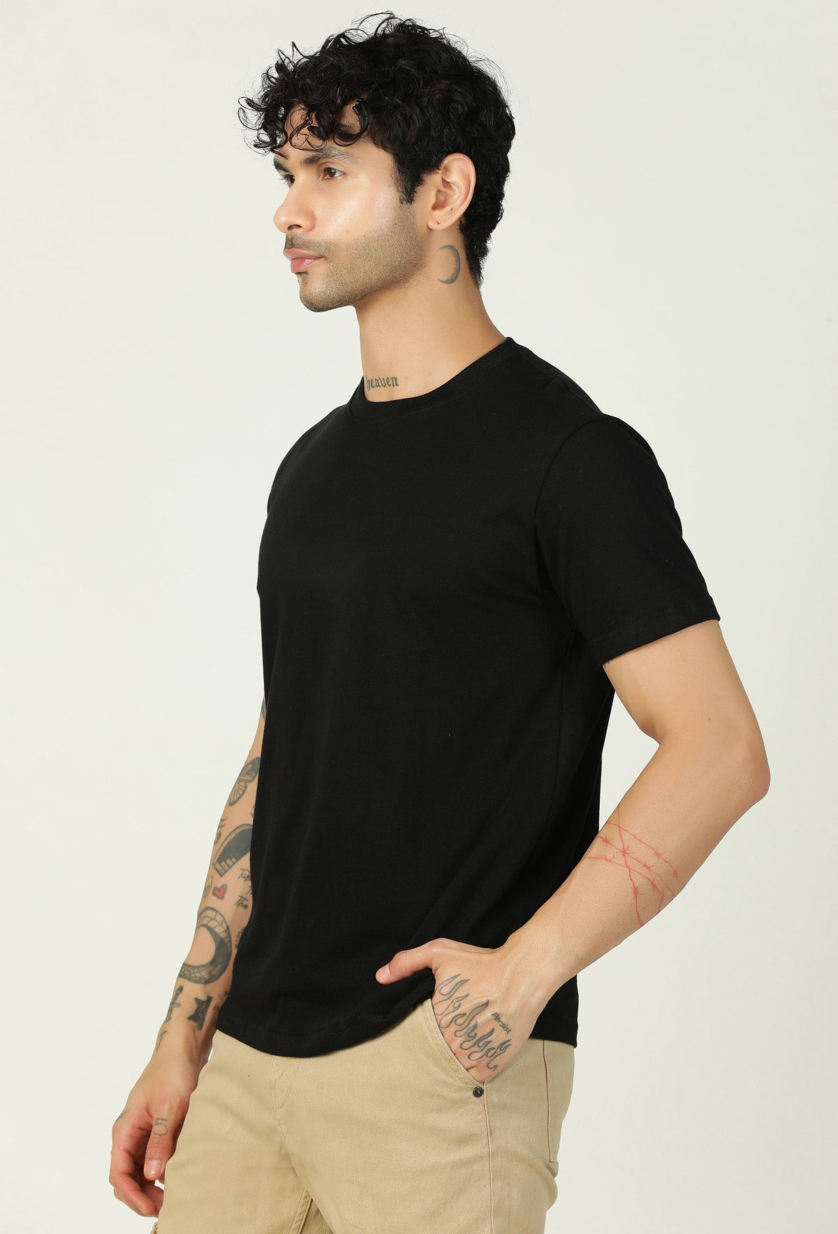 Side view of men's solid black cotton regular-fit T-shirt