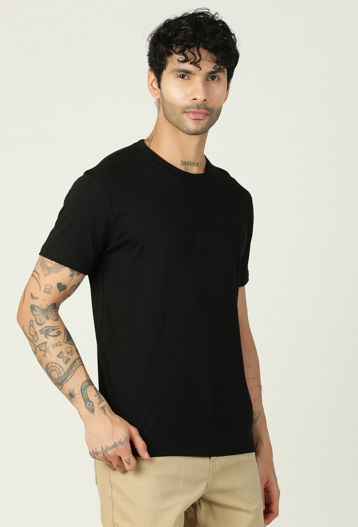Three-quarter view of men's solid black crew-neck T-shirt