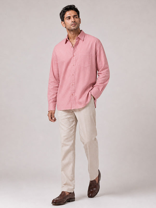 Man wearing a blush pink linen-cotton relaxed-fit full-sleeve shirt
