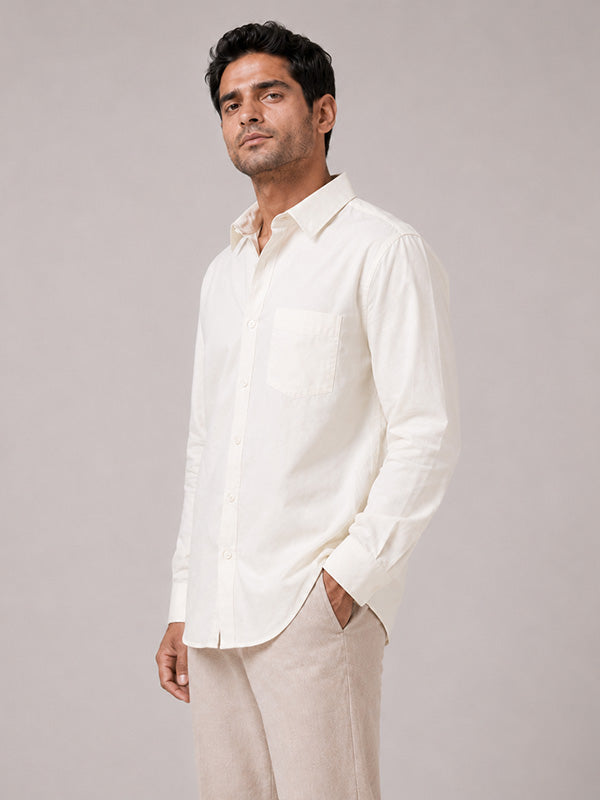 Side view of men's cream cotton relaxed-fit shirt