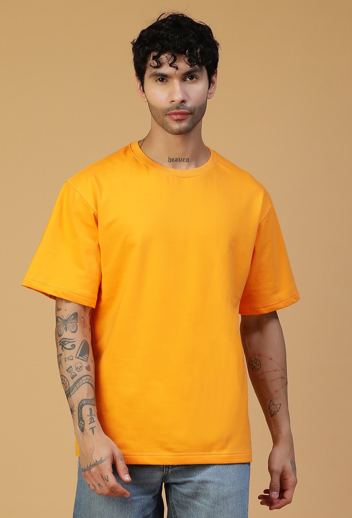 Front view of men's mustard oversized cotton T-shirt