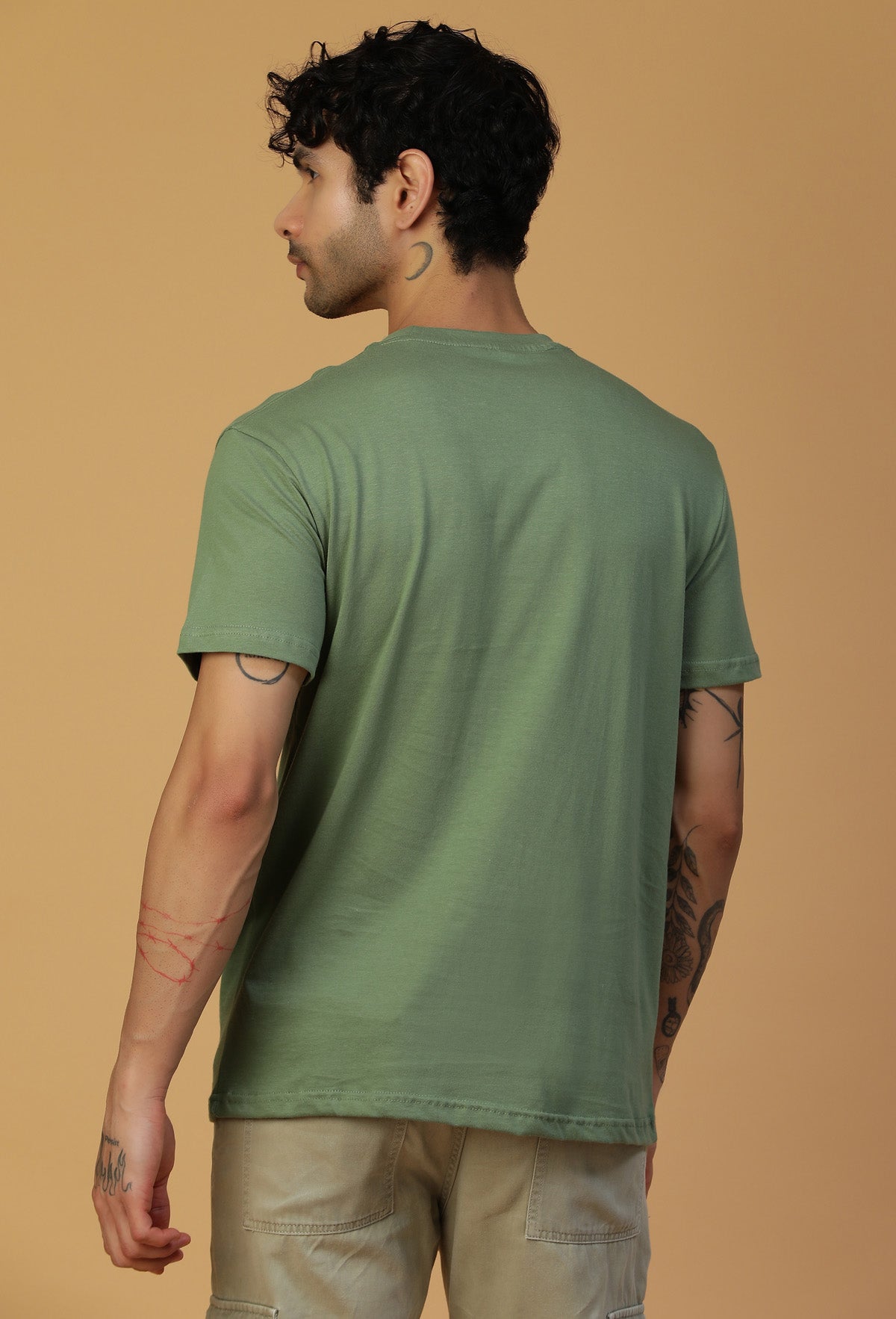 Back view of men's solid olive regular-fit T-shirt