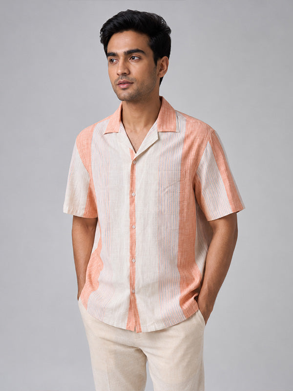 Three-quarter view of men's peach striped relaxed-fit shirt