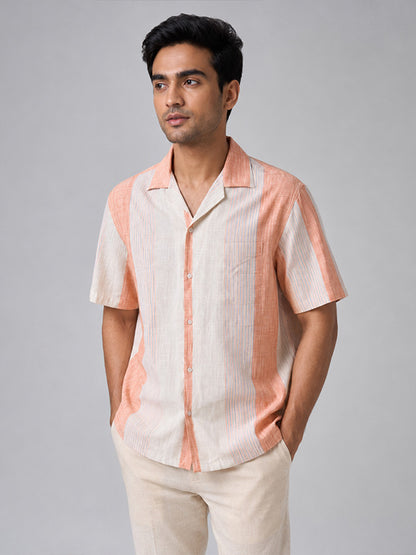 Three-quarter view of men's peach striped relaxed-fit shirt