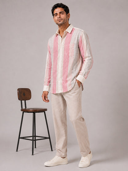 Men's pink striped linen-cotton shirt styled with cream trousers