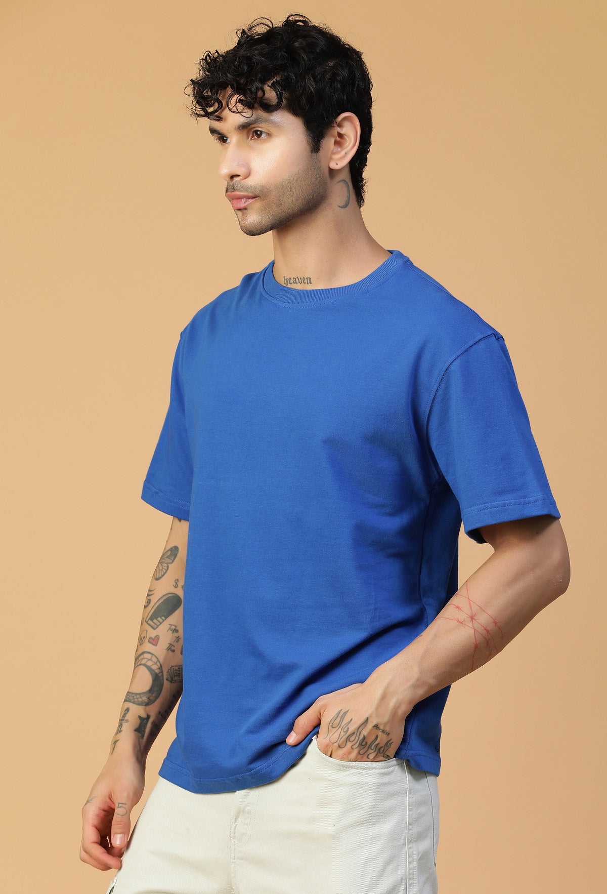 Side view of men's royal blue oversized cotton T-shirt