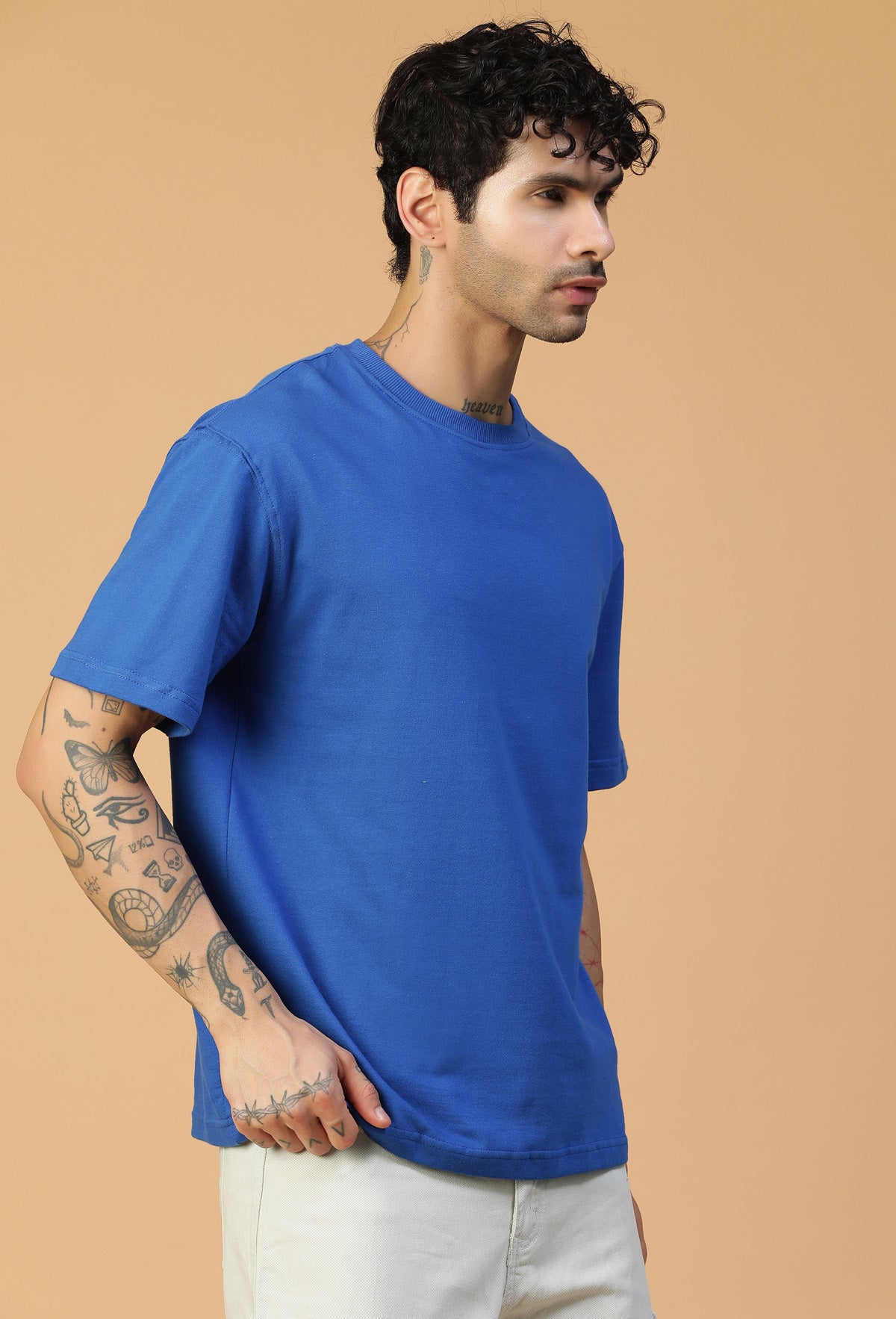 Three-quarter view of men's royal blue drop-shoulder oversized T-shirt