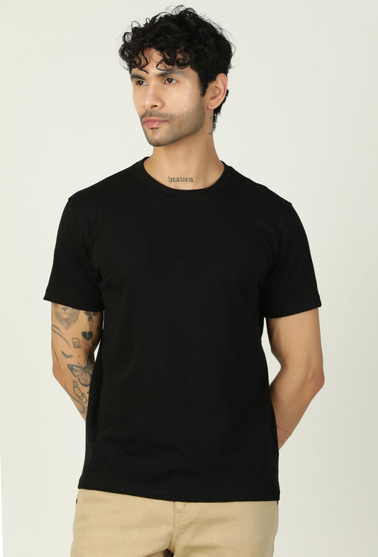 Man wearing a solid black premium cotton regular-fit T-shirt