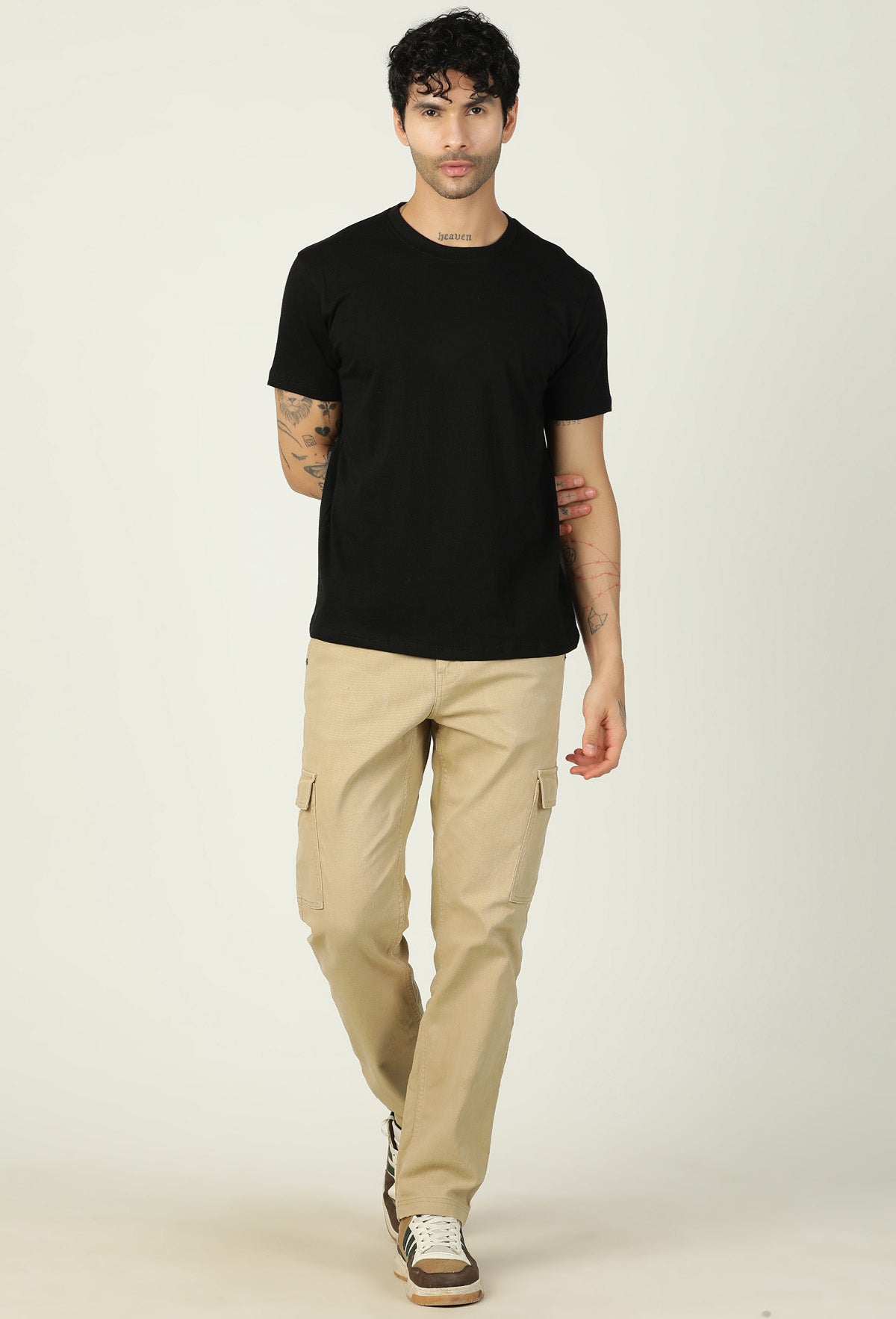 Full-length view of men's solid black regular-fit T-shirt