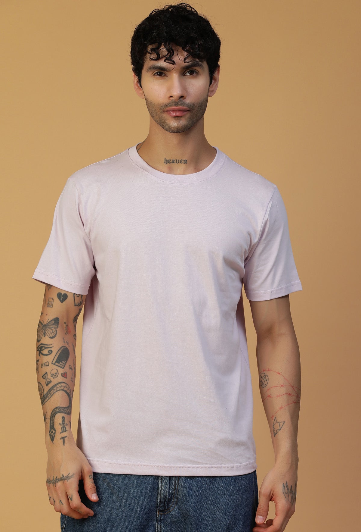 Man wearing a solid lavender premium cotton regular-fit T-shirt