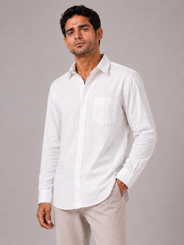 Man wearing a white cotton relaxed-fit full-sleeve shirt
