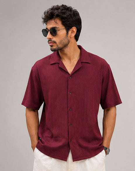 Man wearing a wine textured ribbed relaxed-fit half-sleeve shirt