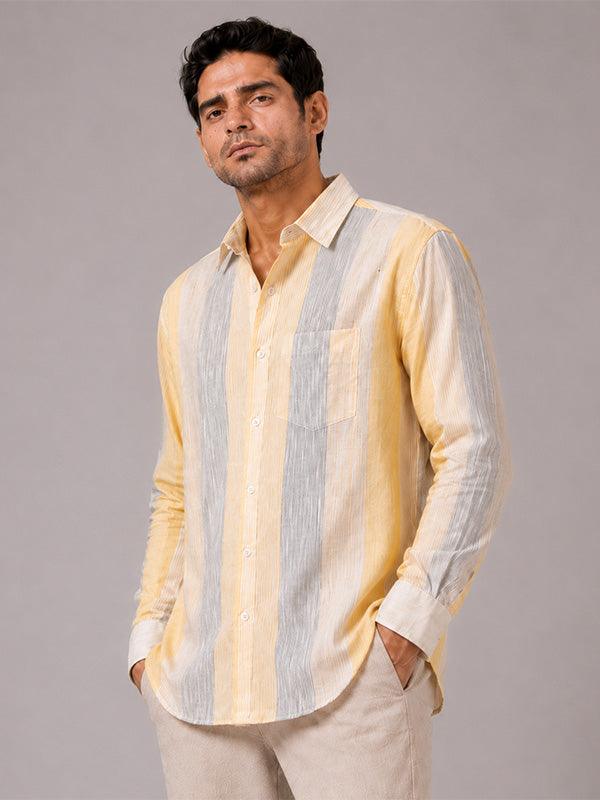 Three-quarter view of men's yellow and grey striped full-sleeve shirt