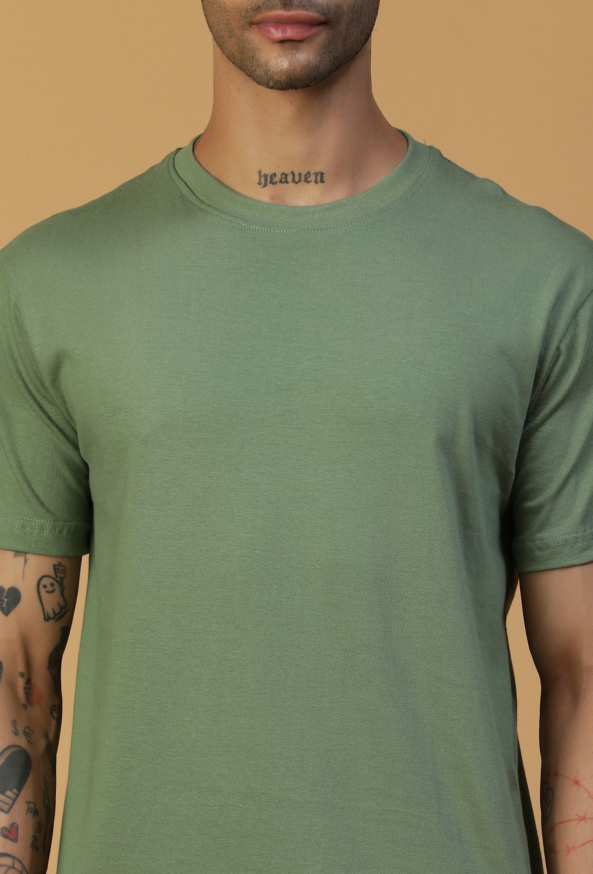 Close-up of olive cotton T-shirt crew neck and fabric