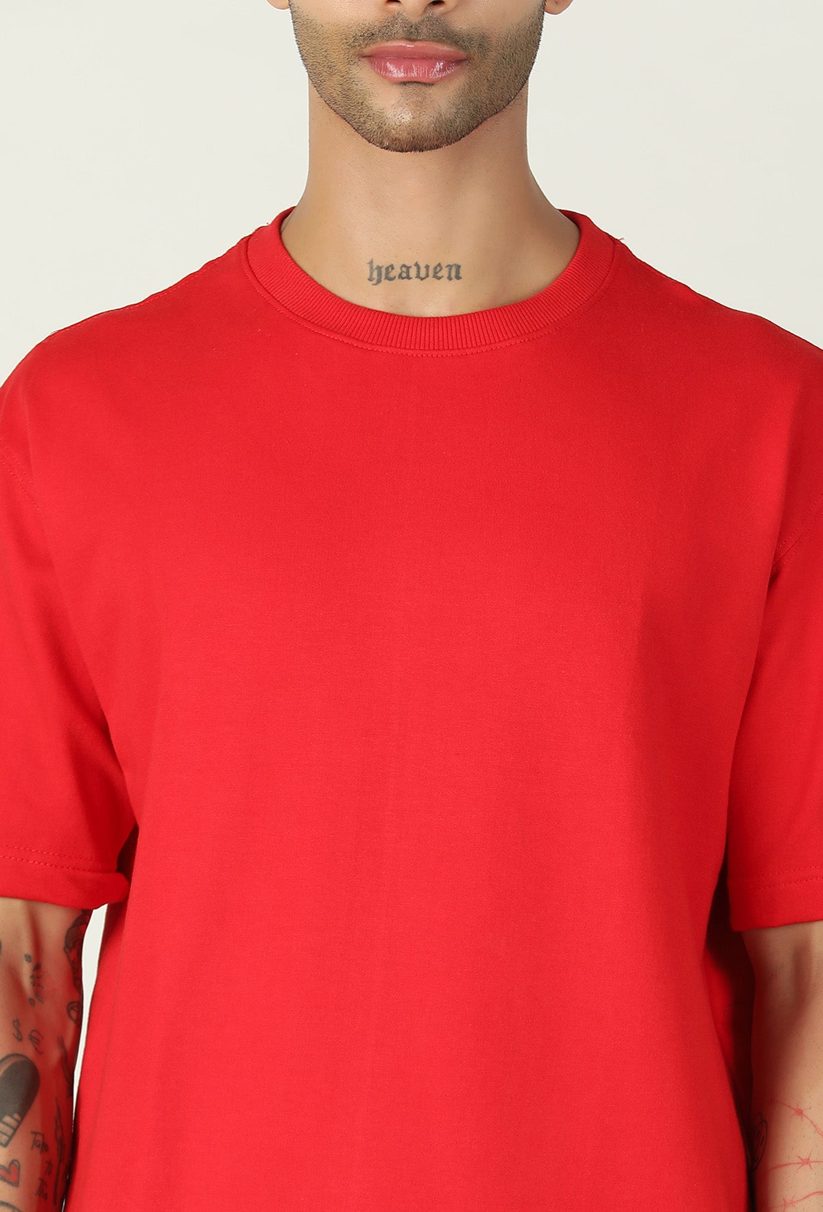 Close-up of red cotton oversized T-shirt crew neck and fabric