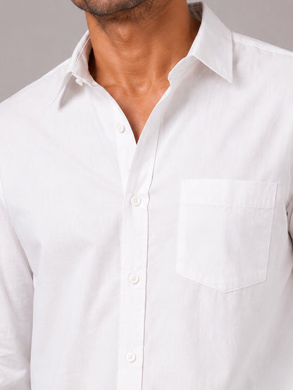 Close-up of white cotton shirt collar, buttons and fabric