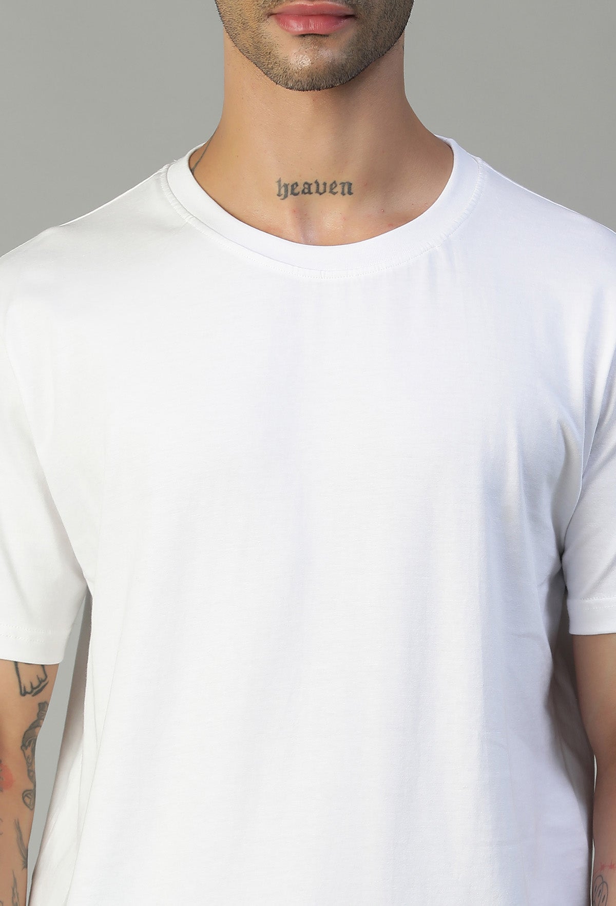 Close-up of white cotton T-shirt crew neck and fabric