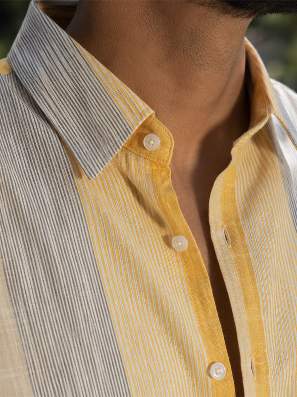Close-up of yellow and grey striped linen-cotton shirt collar and fabric